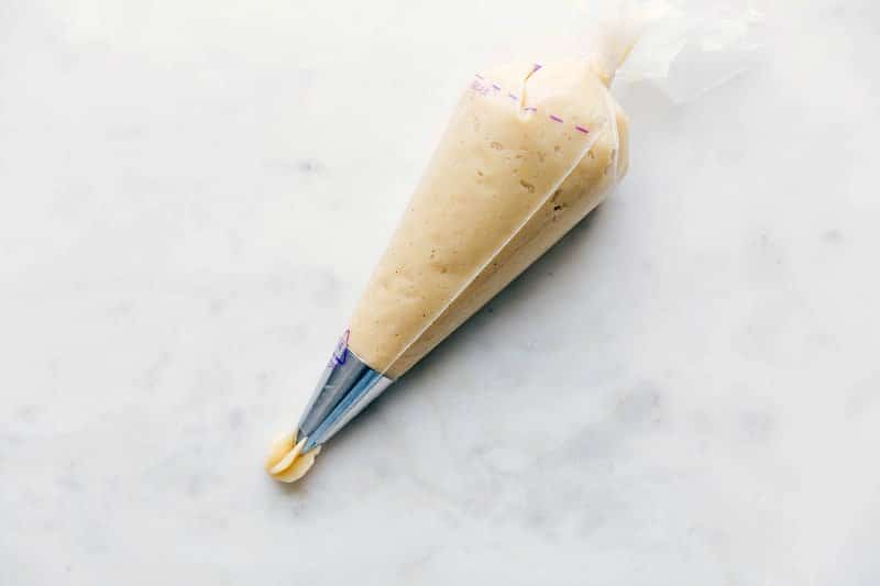 Churro Dough in Piping Bag - Ready to Create Delicious Treats Churro dough inside a pastry piping bag.