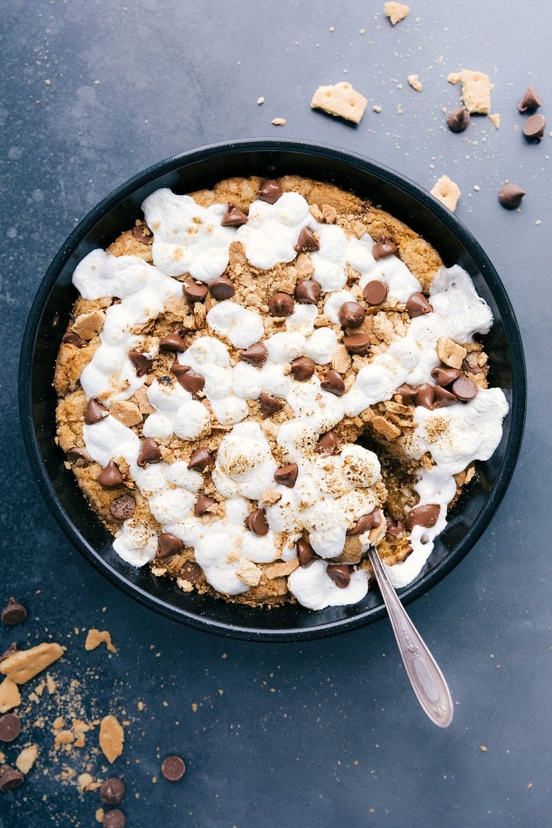 Enjoy the Sweetness: Freshly Baked S'mores Pizookie Ready to Delight Freshly baked s'mores pizookie, warm and gooey, inviting a sweet dessert indulgence.
