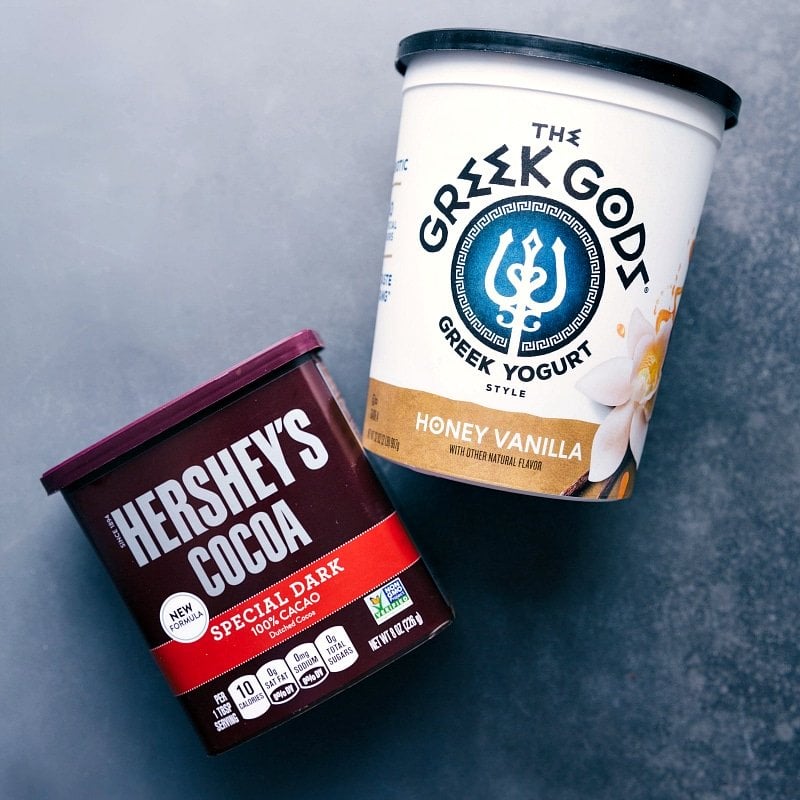 Chocolate Banana Bread is moist, deeply chocolate, and rich! We make this bread in two bowls! Recipe via chelseasmessyapron #breakfast #chocolatechips #dessert #best #quick #easy #simple #chocolate #banana #bread Ingredient shot-- images of the yogurt and cocoa powder used in this recipe