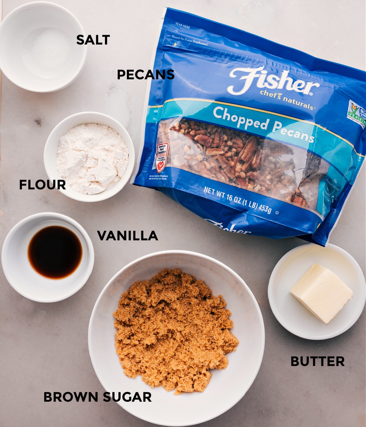 Ingredients For The Crockpot Sweet Potato Casserole Topping The topping ingredients for this Crockpot Sweet Potato Casserole are prepped: chopped pecans, flour, vanilla, sugar, and butter.