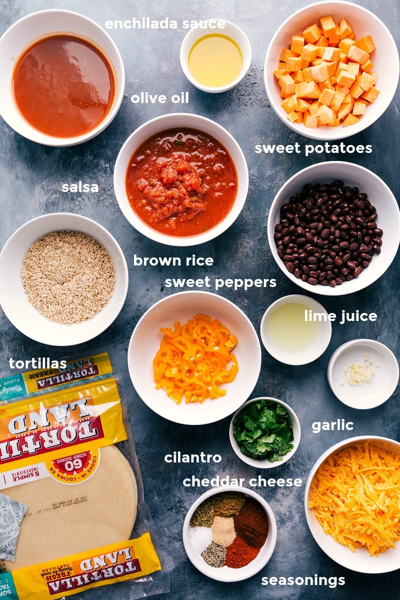 Ingredients In Sweet Potato And Black Bean Enchiladas All the ingredients in this recipe prepped out for easy assembly including the enchilada sauce, oil, sweet potatoes, salsa, black beans, peppers, rice, lime, garlic, cilantro, cheese, seasonings, and tortillas.