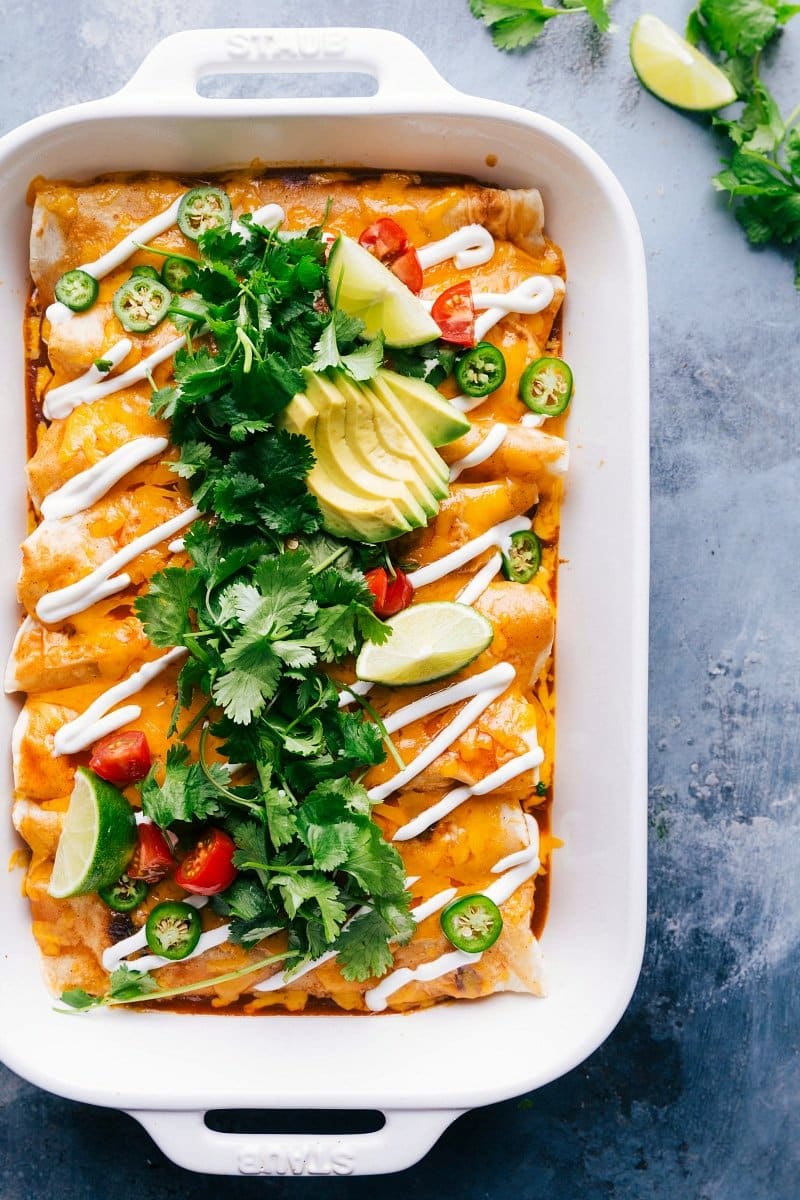 Sweet Potato And Black Bean Enchiladas with a delicious filling, topped with melted cheese.