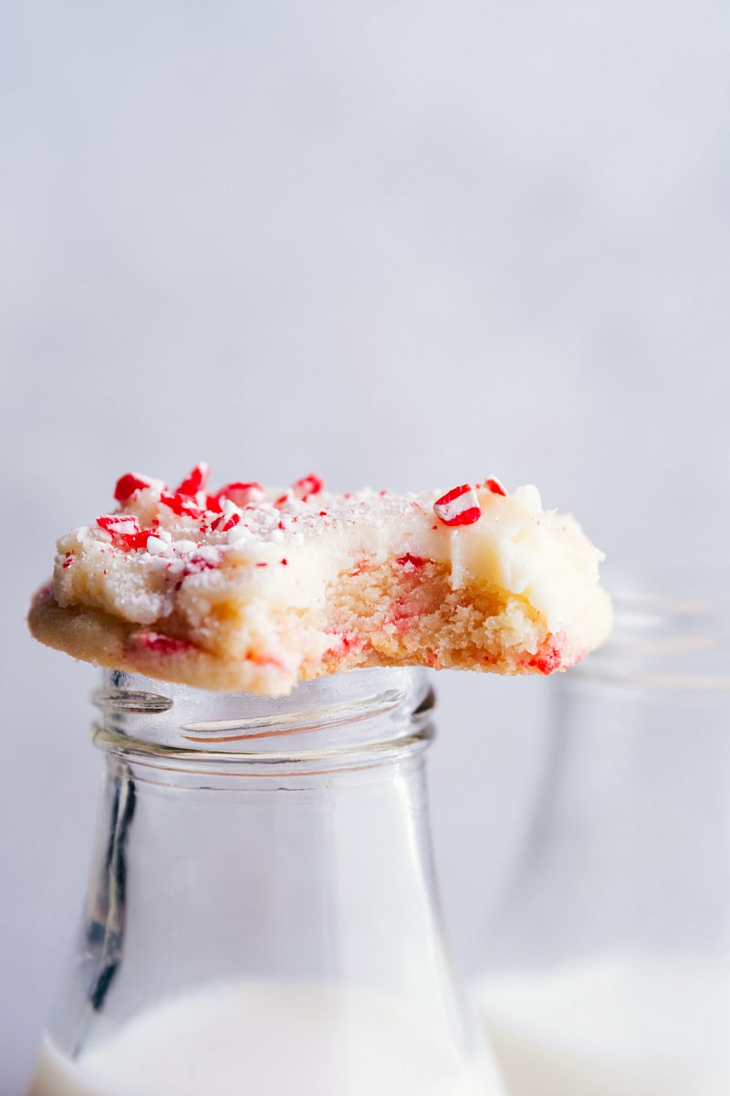 Peppermint Sugar Cookies on a glass of milk.