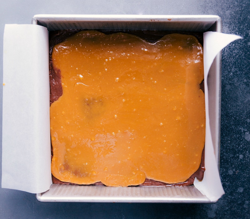 Our Favorite Microwave Fudge Microwave Fudge with caramel spread evenly on top.