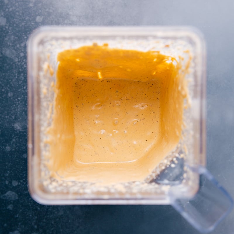 Chipotle Ranch Dip is an explosion of flavor and has a great kick of spice! Recipe via chelseasmessyapron #gameday #best #spicy #quick #easy #simple #blender #chipotle #ranch #dip Image of the blended Chipotle Ranch Dip, still in the blender