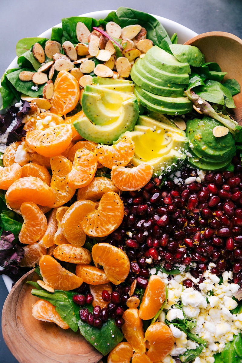 Orange Pomegranate Salad Ready to Serve - Dressed to Impress The delicious side dish dressed with homemade vinaigrette, ready for serving.
