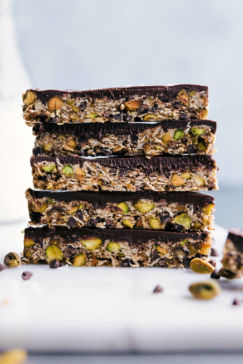Healthy and Delicious Granola Bars: Stacked and Ready to Enjoy A finished granola bar stacked on top of others, showcasing their healthy and delicious interior.