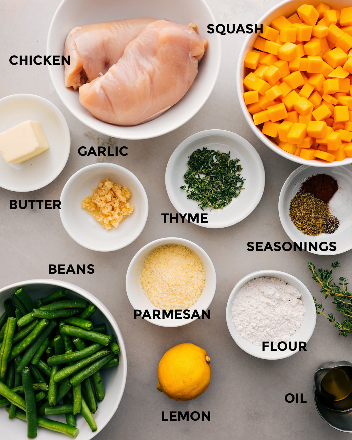 Ingredients In Chicken And Butternut Squash Recipe All the ingredients for this recipe are prepped and ready for easy assembly, including the meat, veggies, fresh herbs, butter, Parmesan, flour, seasonings, and lemon.