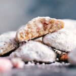 Delicious and seasonal desserts stacked on top of each other, with a bite out of one revealing the moist and flavor-packed interior.