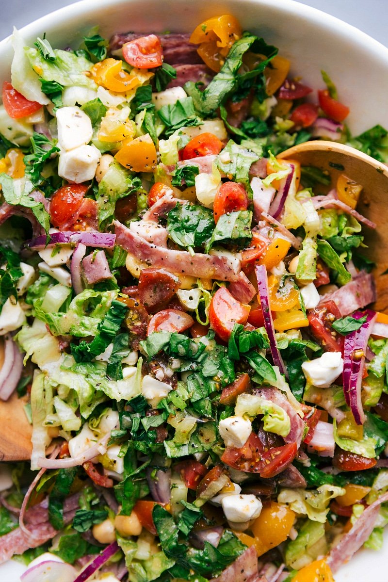 Refreshing Chopped Italian Salad, Dressed and Table-Ready Chopped italian salad, fresh and dressed, ready to be enjoyed.