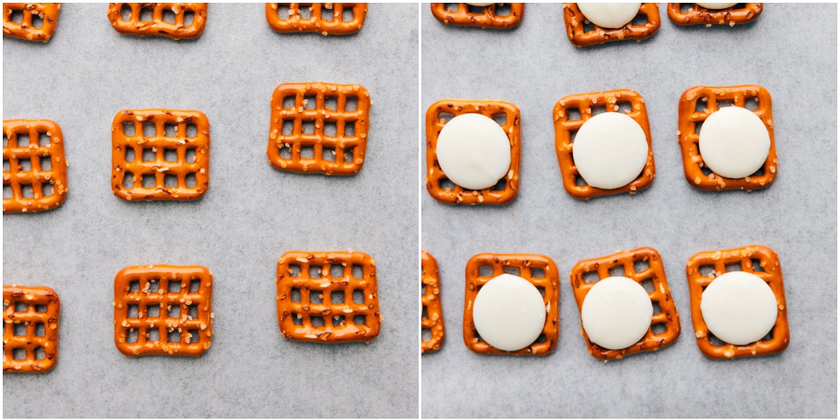 How To Make M&M Flower Pretzels Pretzels laid out on a sheet pan and white chocolate wafers placed on top to go in the oven.