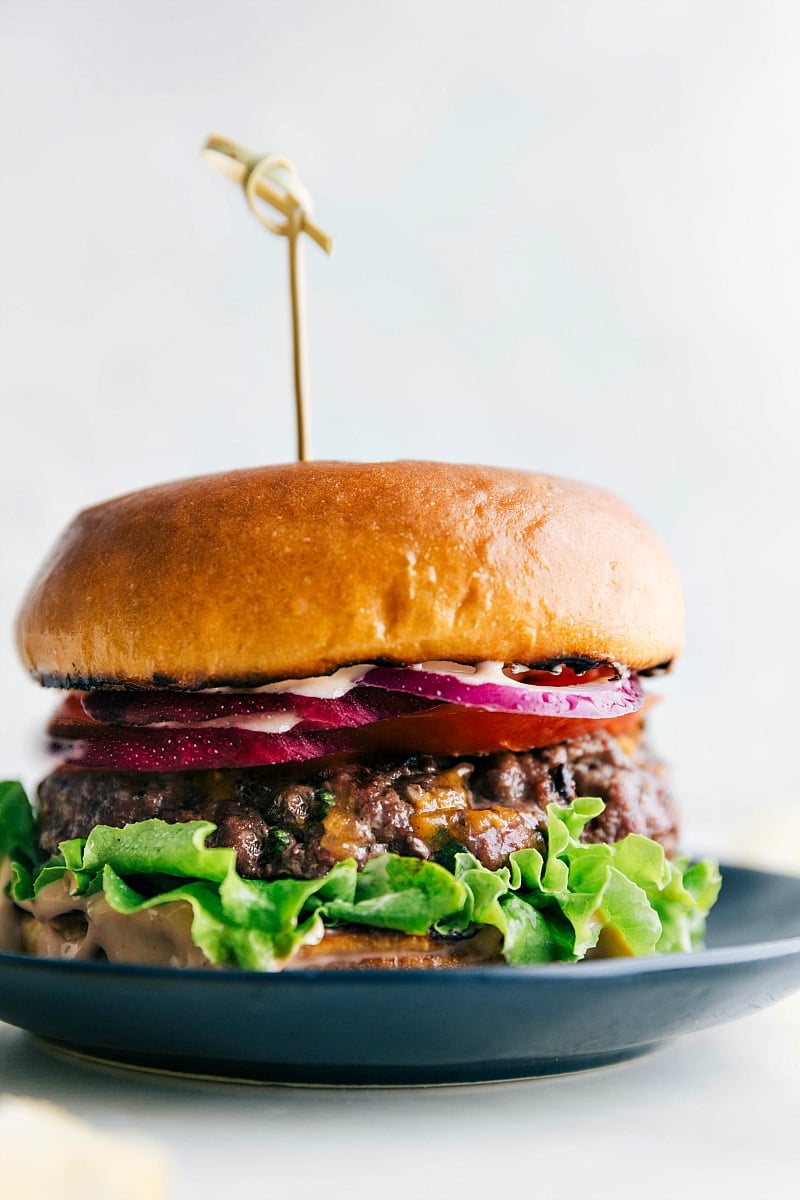 Delicious Burger with Juicy Patty and Toppings A mouthwatering burger created from this burger recipe, featuring a juicy patty sandwiched between soft buns, topped with a variety of delicious toppings.