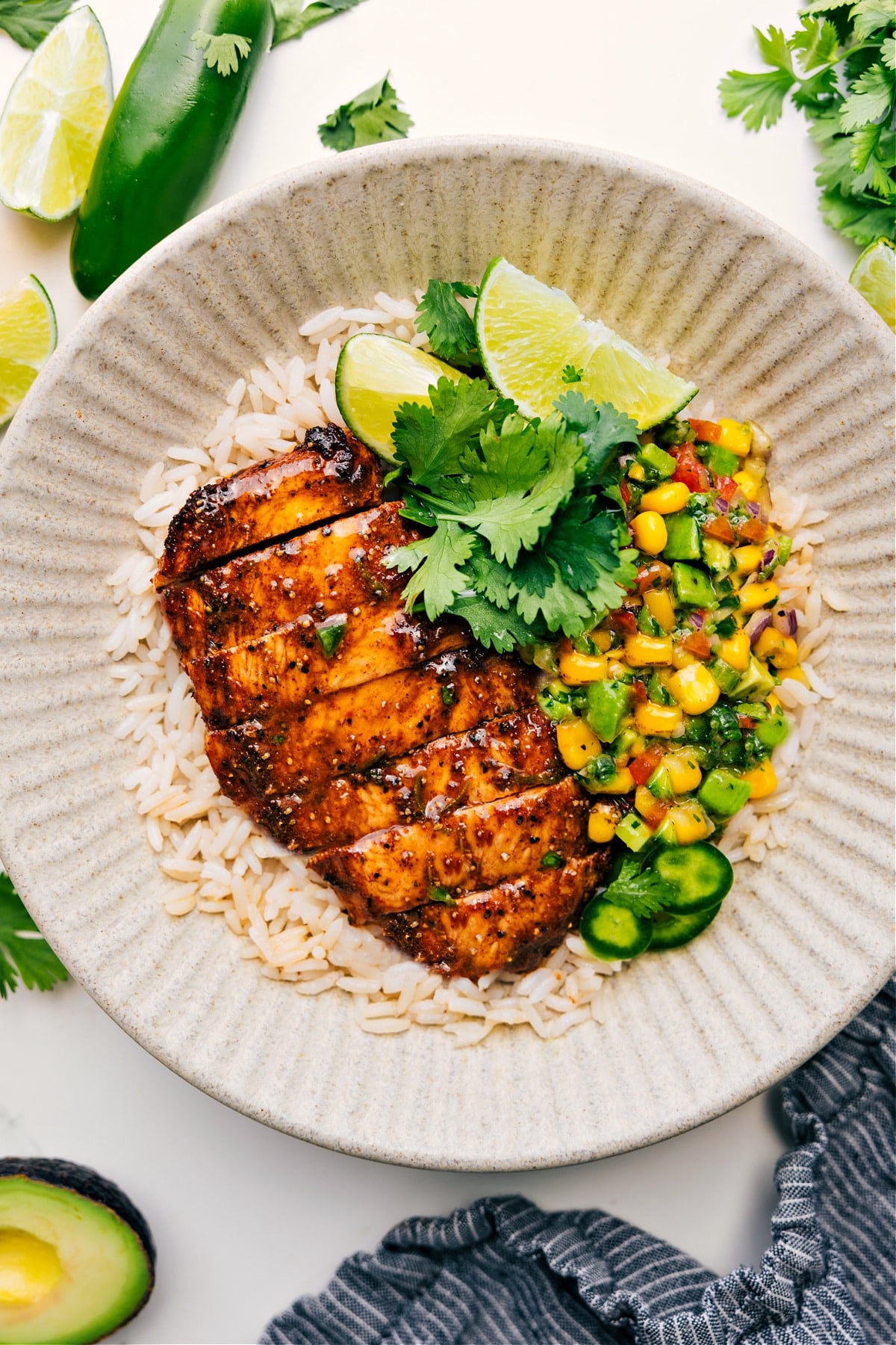 The Best Summer Chicken Recipe: Grilled Taco Chicken With Avocado Salsa Summer Chicken Recipe: Grilled taco chicken served with a side of avocado salsa, all on a bed of rice.