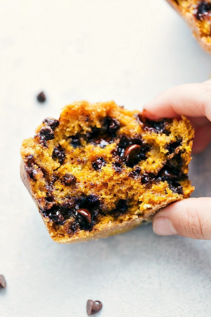 Sky-high bakery-style Pumpkin-Chocolate Chip Muffins are flavorful, moist, and so delicious! Pumpkin-Chocolate Chip Muffins
