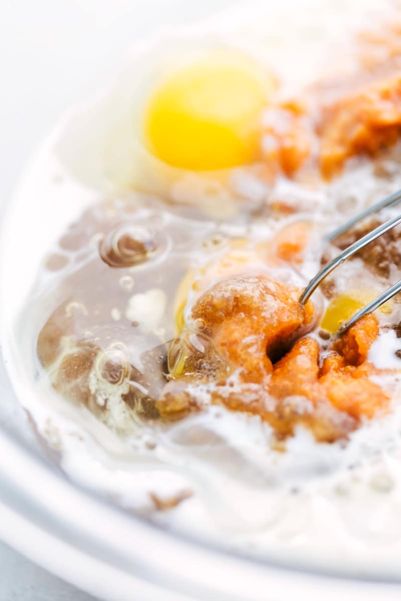 Sky-high bakery-style Pumpkin-Chocolate Chip Muffins are flavorful, moist, and so delicious! Pumpkin-Chocolate Chip Muffins