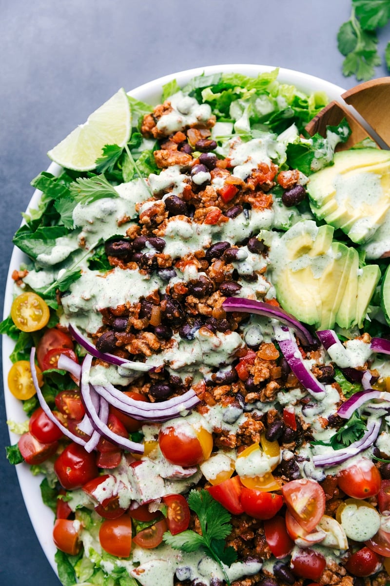 Turkey Taco Salad: Bright, Colorful, and Ready for Enjoyment Vibrant and colorful turkey taco salad, fully dressed and ready to serve.