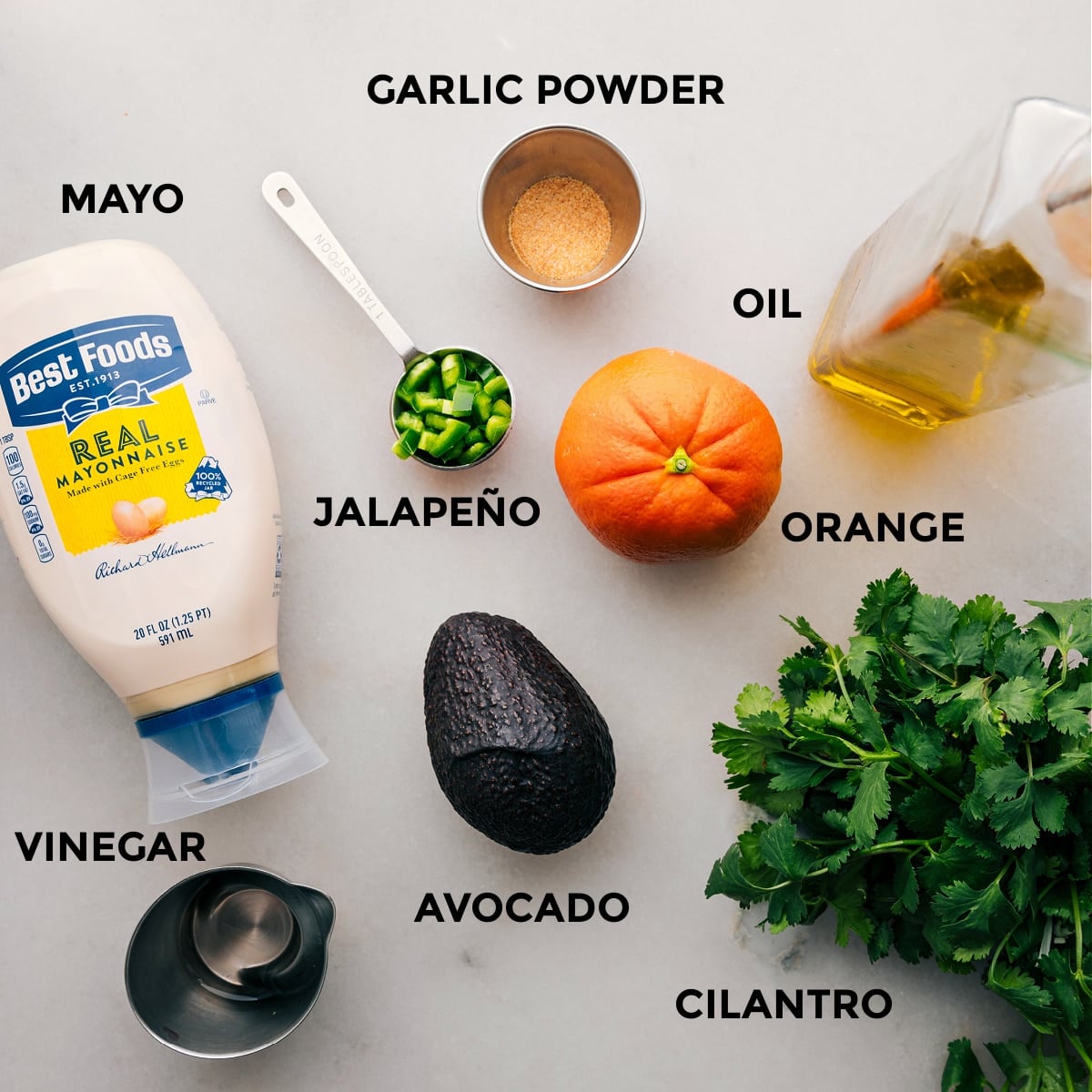 Ingredients In The Best Dressing Mojo Salmon Bowls dressing ingredients ready to being blended together.