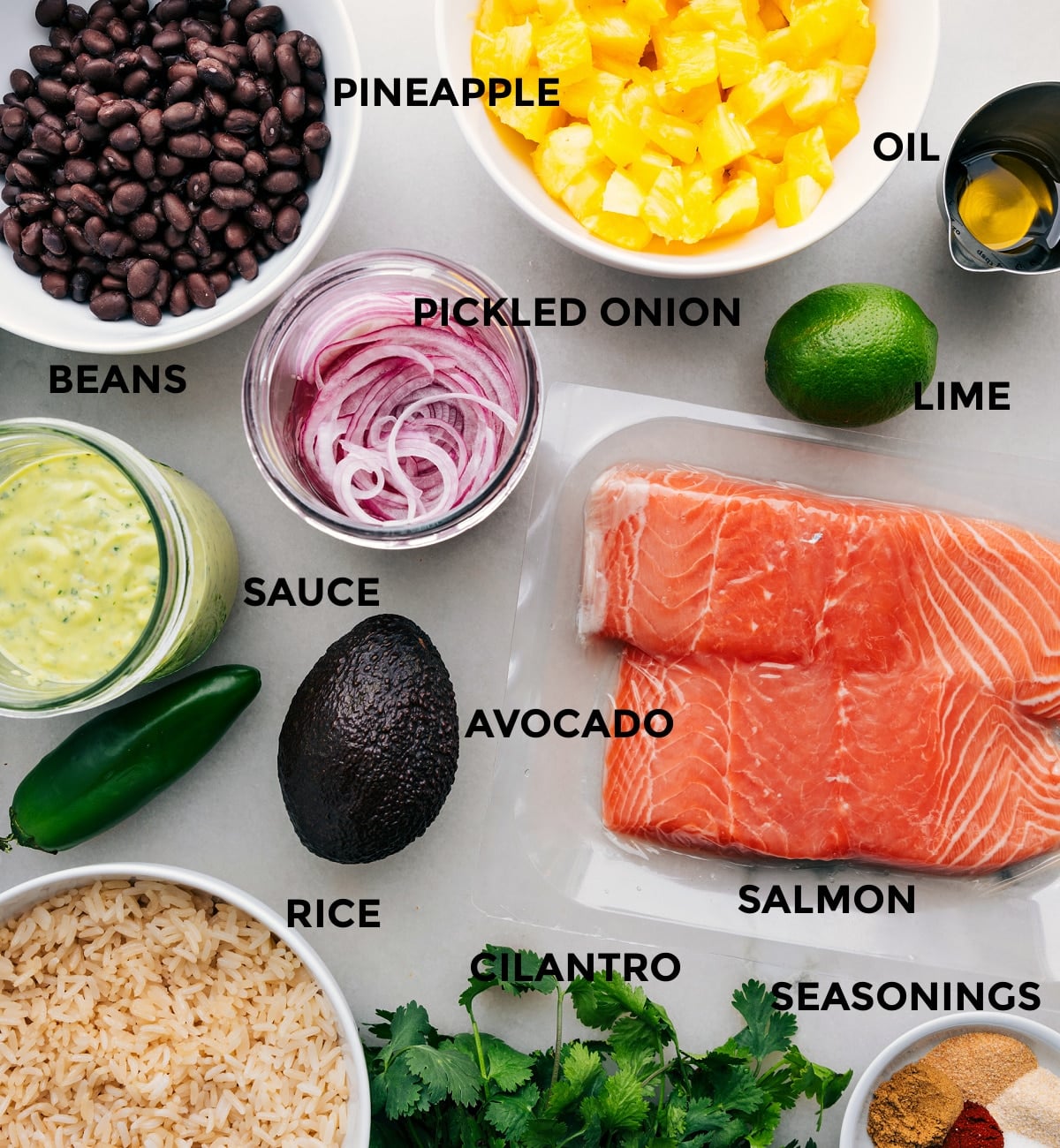 Ingredients In Mojo Salmon Bowls Prepped All the ingredients in this recipe prepped out for easy assembly.