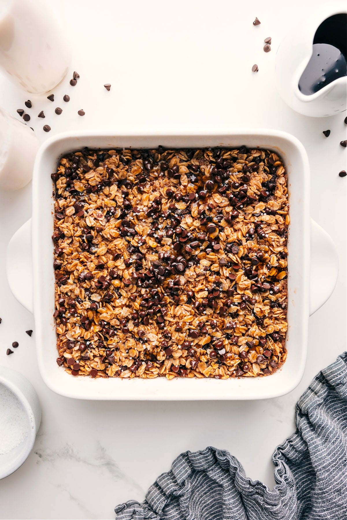The Perfect Breakfast: Chocolate Chip Baked Oatmeal Chocolate Chip Baked Oatmeal in the pan with flaky sea salt on top.