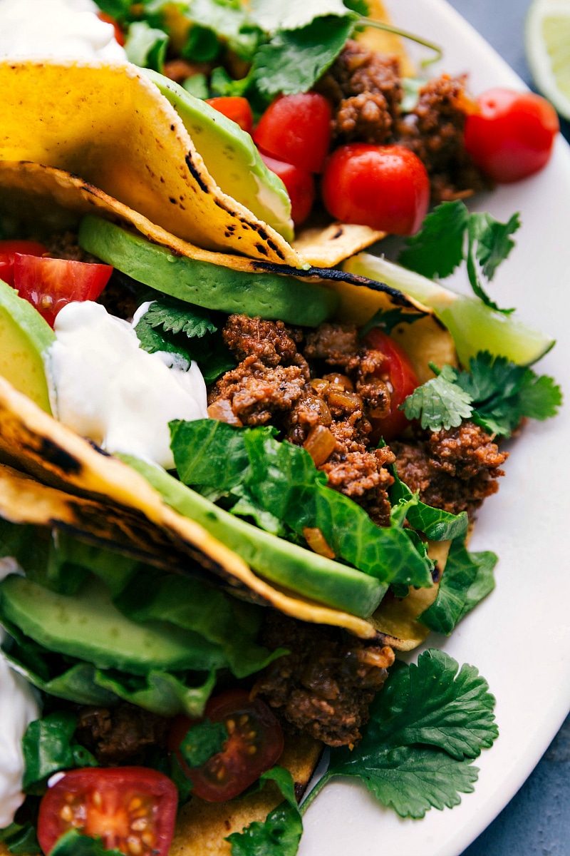 Perfection on a Plate: The Best Turkey Taco Recipe with Toppings, Ready to Savor The ultimate turkey taco recipe, meticulously assembled on a plate with a medley of toppings, eagerly awaiting to be relished.