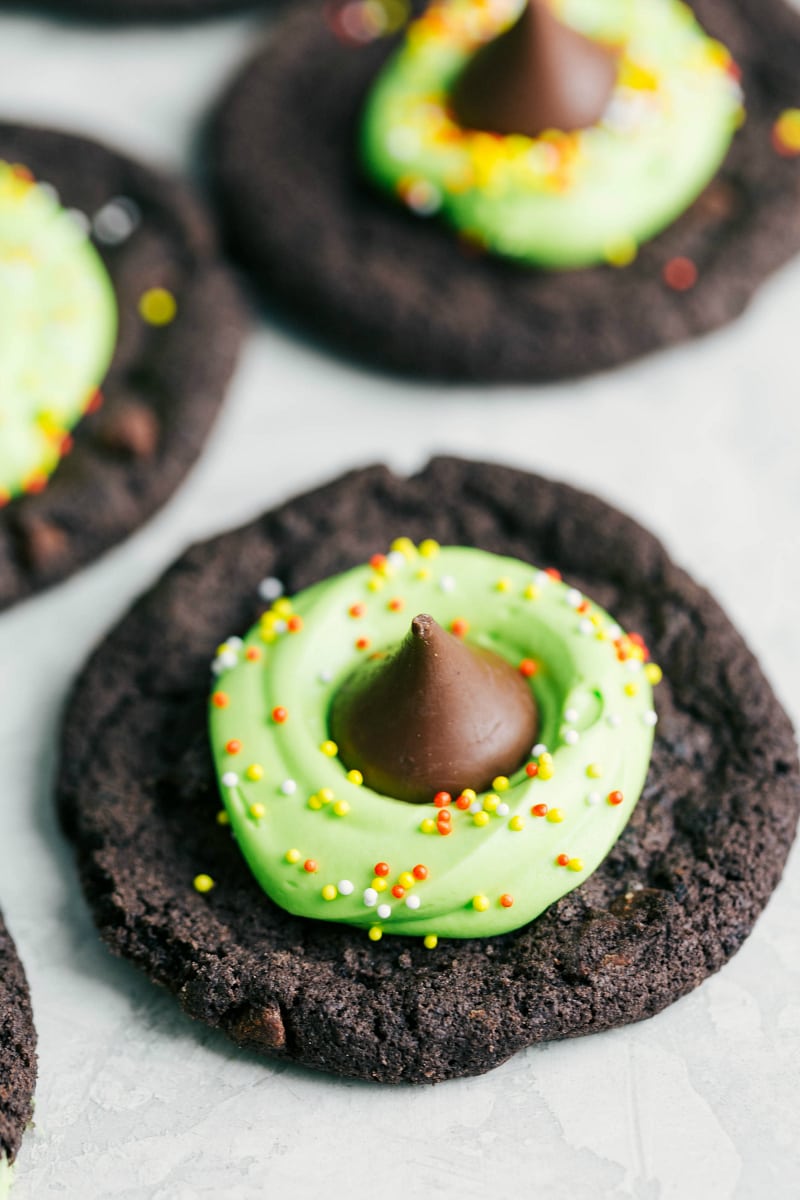 Only 4 ingredients to make these festive, fun, and most importantly DELICIOUS Halloween cookies! Halloween cookies decorated to look like a witch's hat.