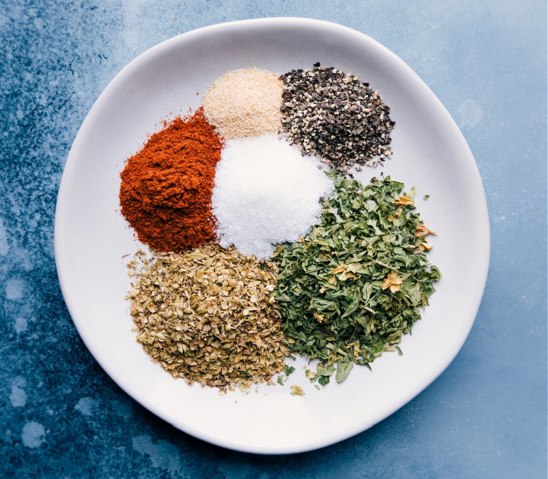 The best ever Sausage Kabobs are simple to make, nutritious, and loaded with flavor! Recipe via ChelseasMessyApron #dinner #quick #easy #healthy #whole #whole30 #keto #veggies #grilled #summer #sausage #kabobs Image of the seasonings used in this dish