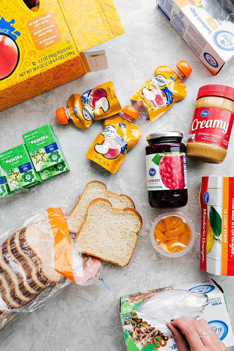 Ingredients for Healthy School Lunches A variety of healthy ingredients laid out to prepare school lunches, including fresh fruits, vegetables, whole grains, and lean proteins.