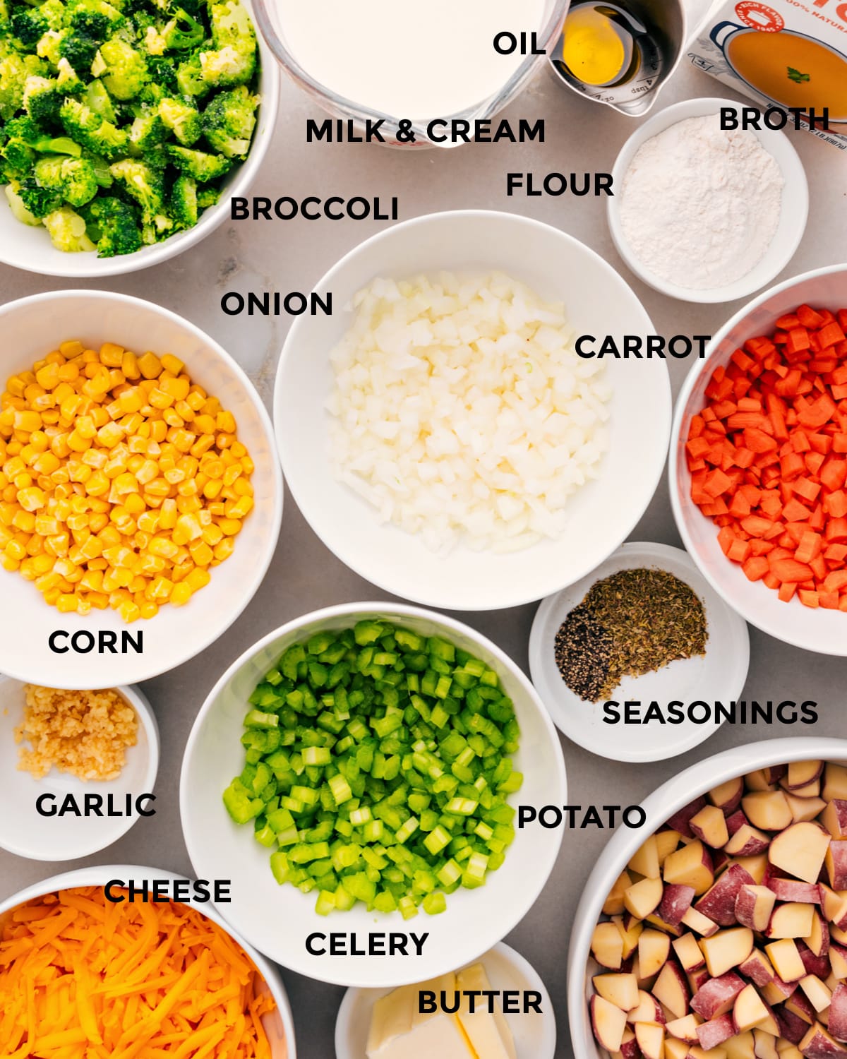 Ingredients In Creamy Vegetable Soup Recipe All the ingredients for this recipe are prepped for easy assembly: veggies, flour, broth, milk, cream, seasonings, cheese, and butter.