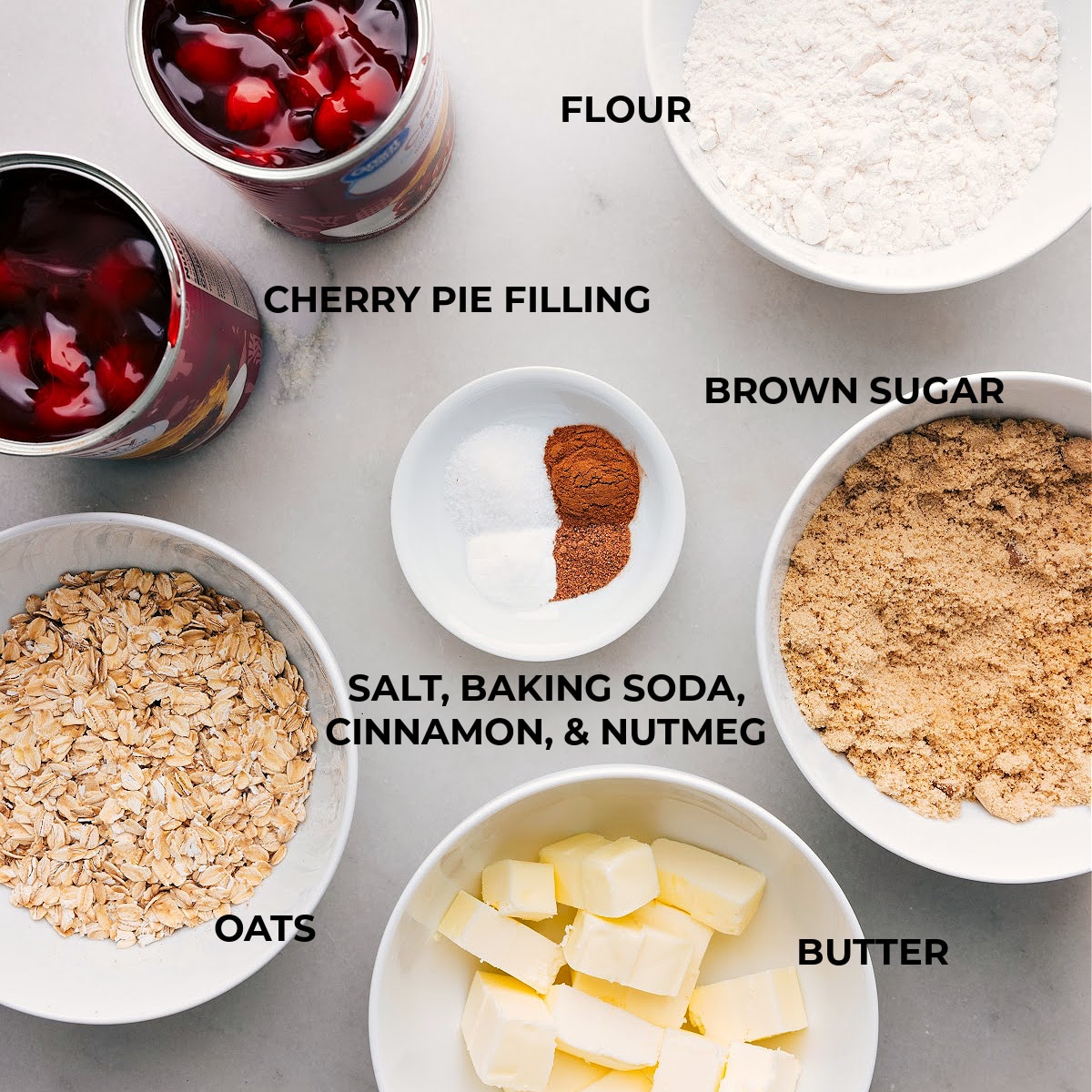 Cherry Crisp Recipe Ingredients Ingredients used for the dessert, featuring cherries, oats, sugar, and more.