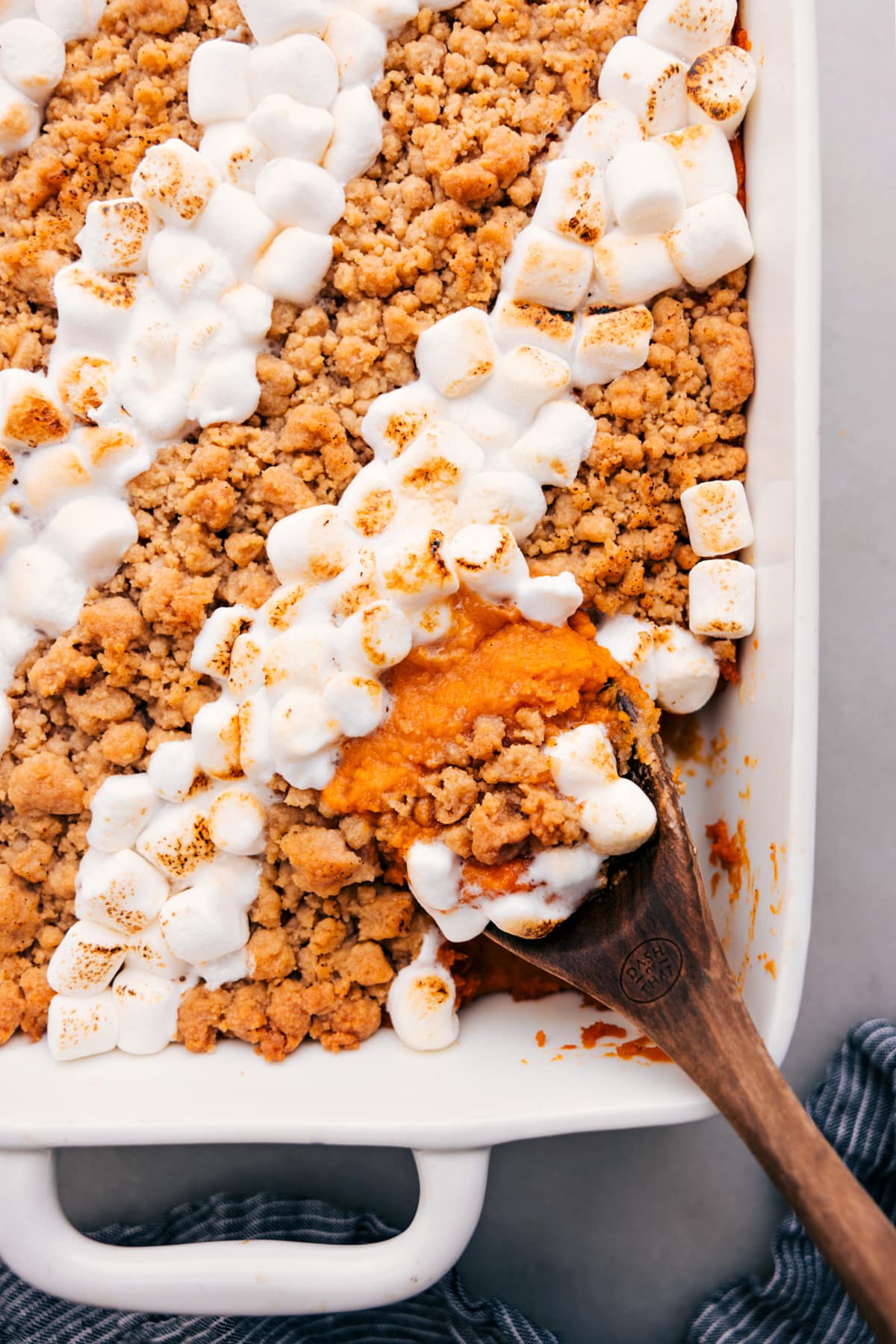 Sweet Potato Casserole fresh out of the oven with two toppings: streusel and marshmallows.