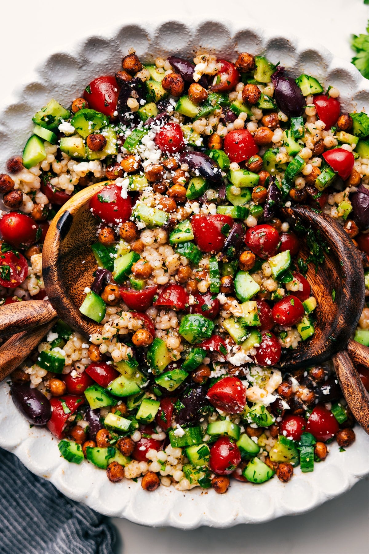 Chickpea Salad fully mixed and coated in dressing, ready to serve.