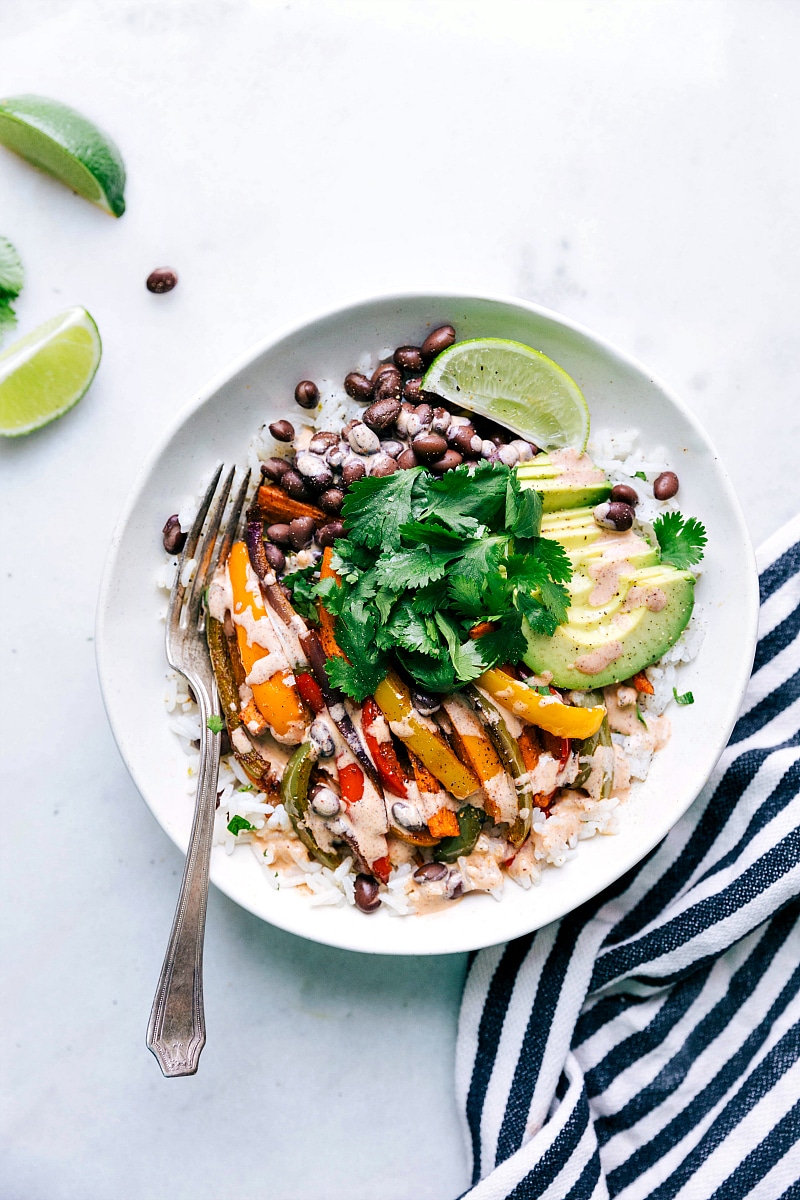 Veggie-packed fajitas in a bowl with perfectly seasoned sweet potatoes, bell peppers, and onion. Vegetarian Fajitas in a bowl