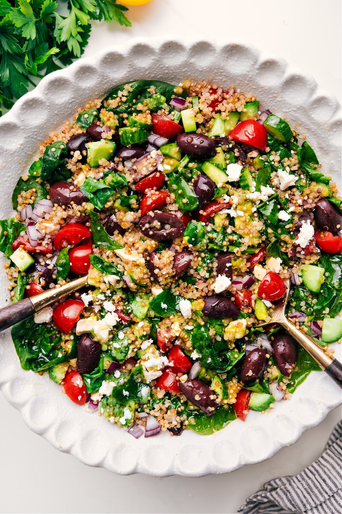 Greek Quinoa Salad Ready To Enjoy Greek quinoa salad in a bowl, dressed and ready to enjoy.