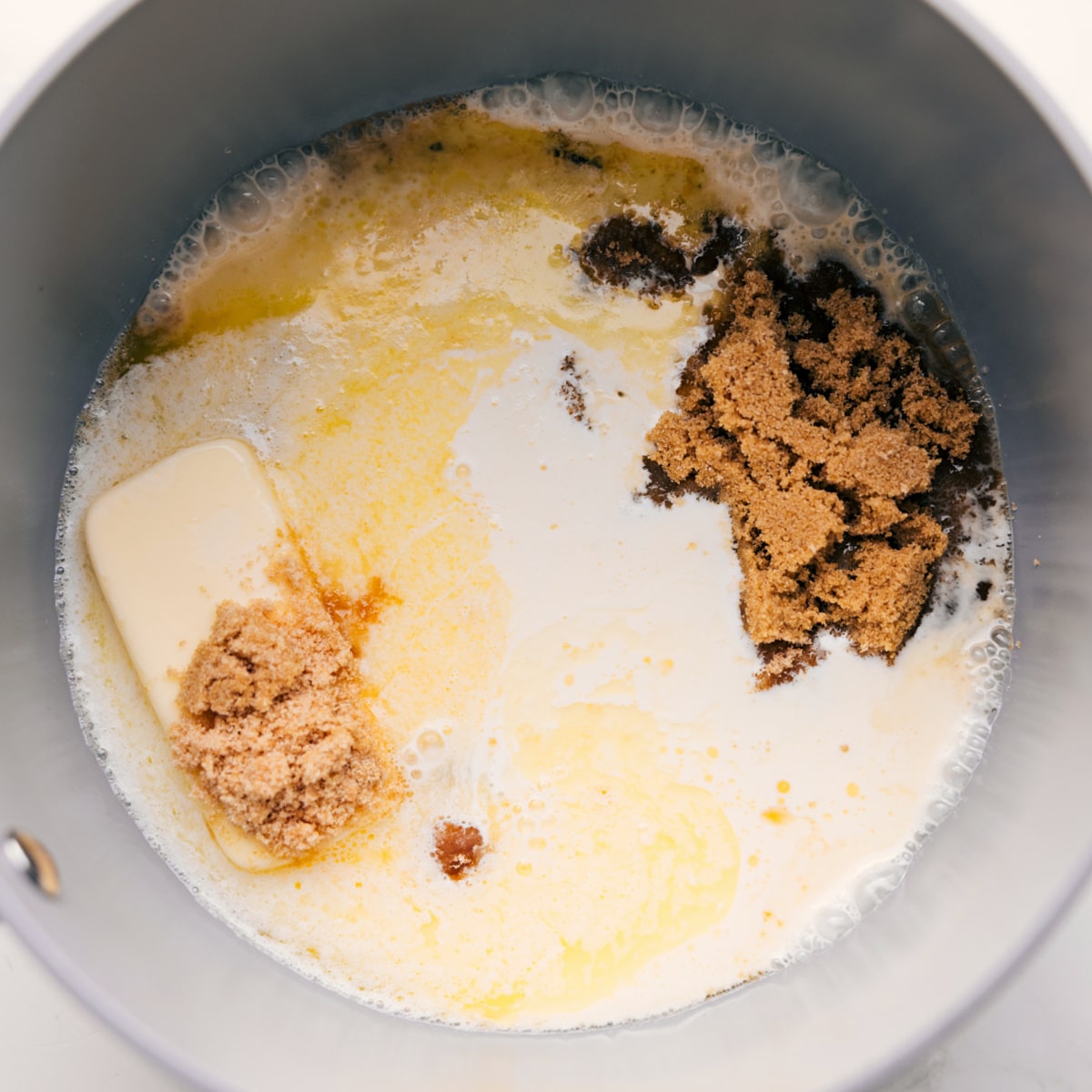 This simple stovetop Vanilla Sauce requires only five ingredients and less than 10 minutes prep time! Recipe via chelseamessyapron #forbreadpudding #easy #recipe #desserts #forwaffles #forpancakes #vanilla #sauce