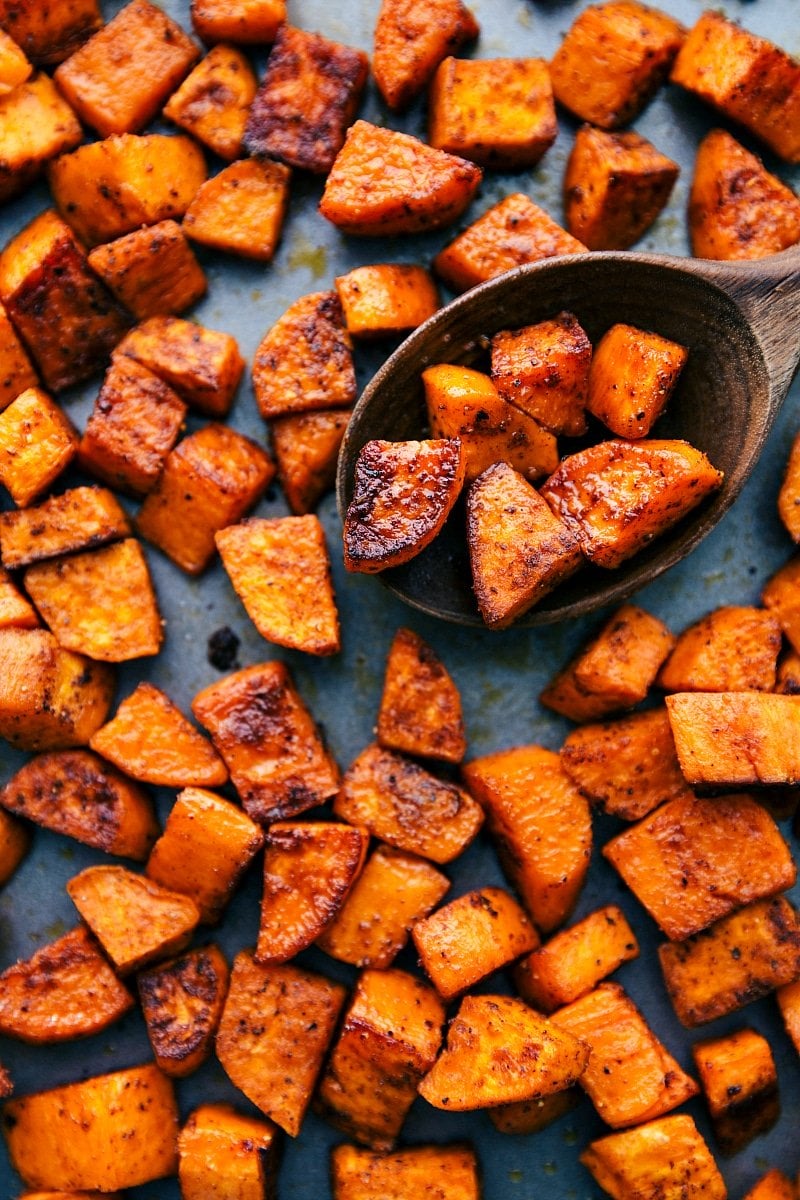 Delicious roasted sweet potatoes ready to eat Finished roasted sweet potatoes on a sheet pan