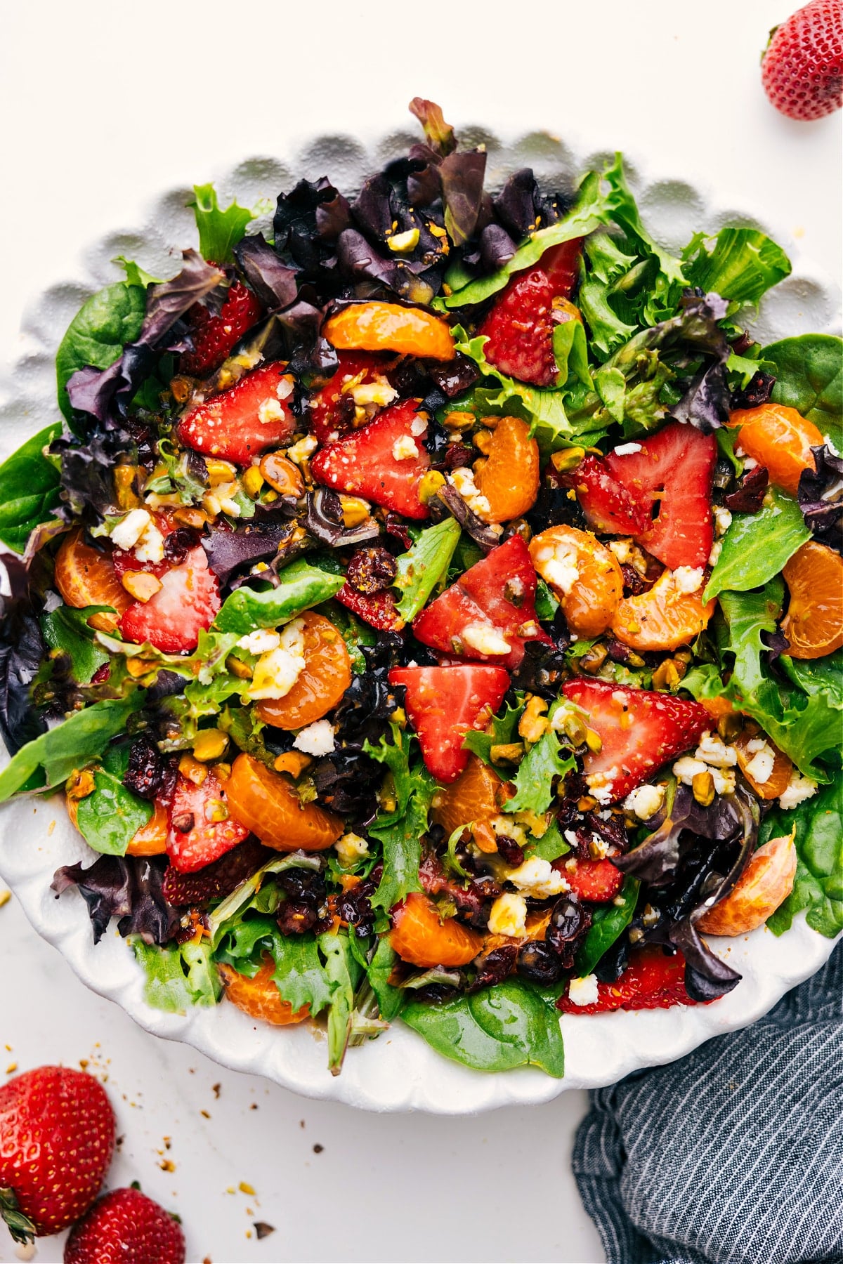 Strawberry Salad mixed and topped with dressing, ready to enjoy.