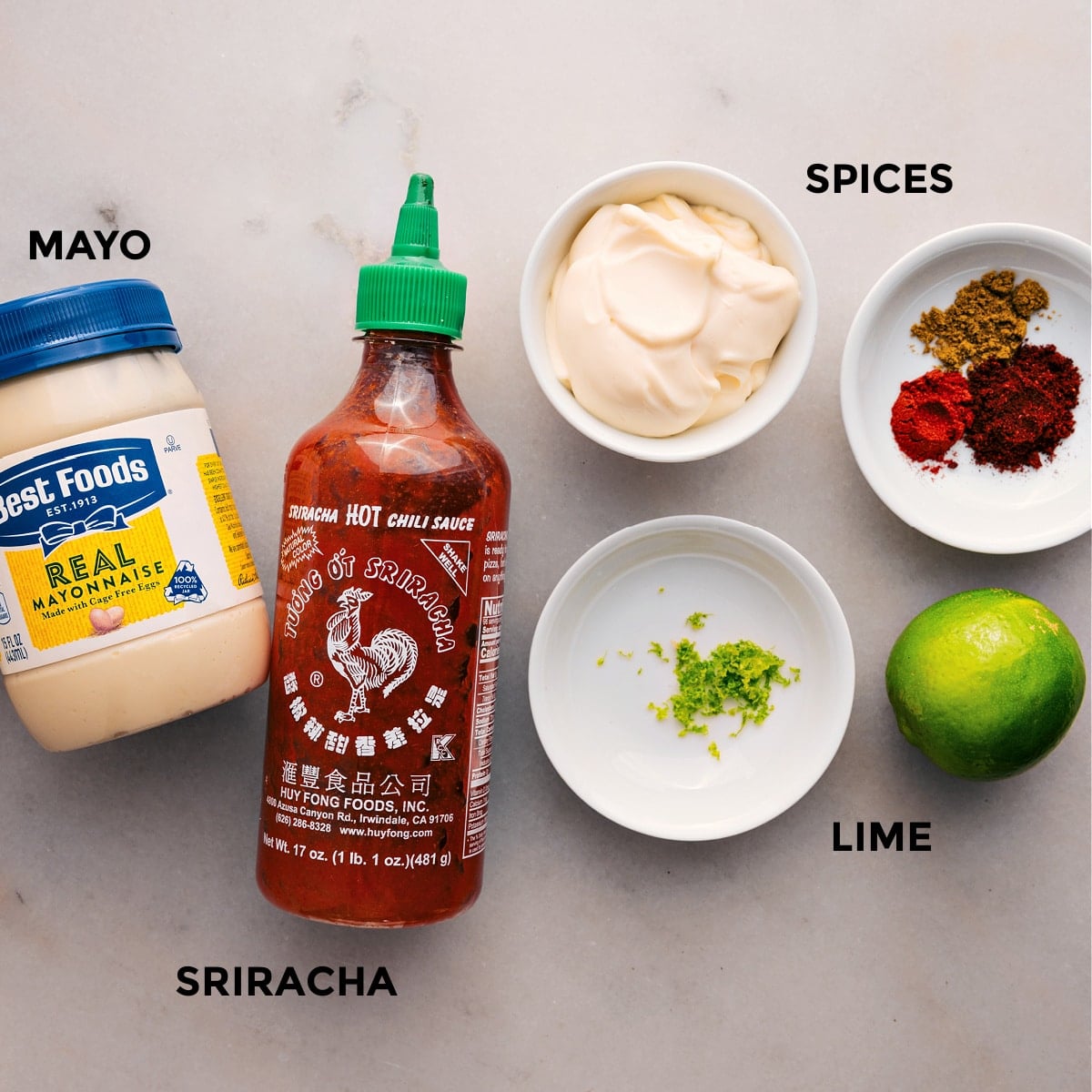 How To Make The Best Sauce For Loaded Sweet Potatoes All the sauce ingredients are prepped—spices, mayo, lime, and sriracha.