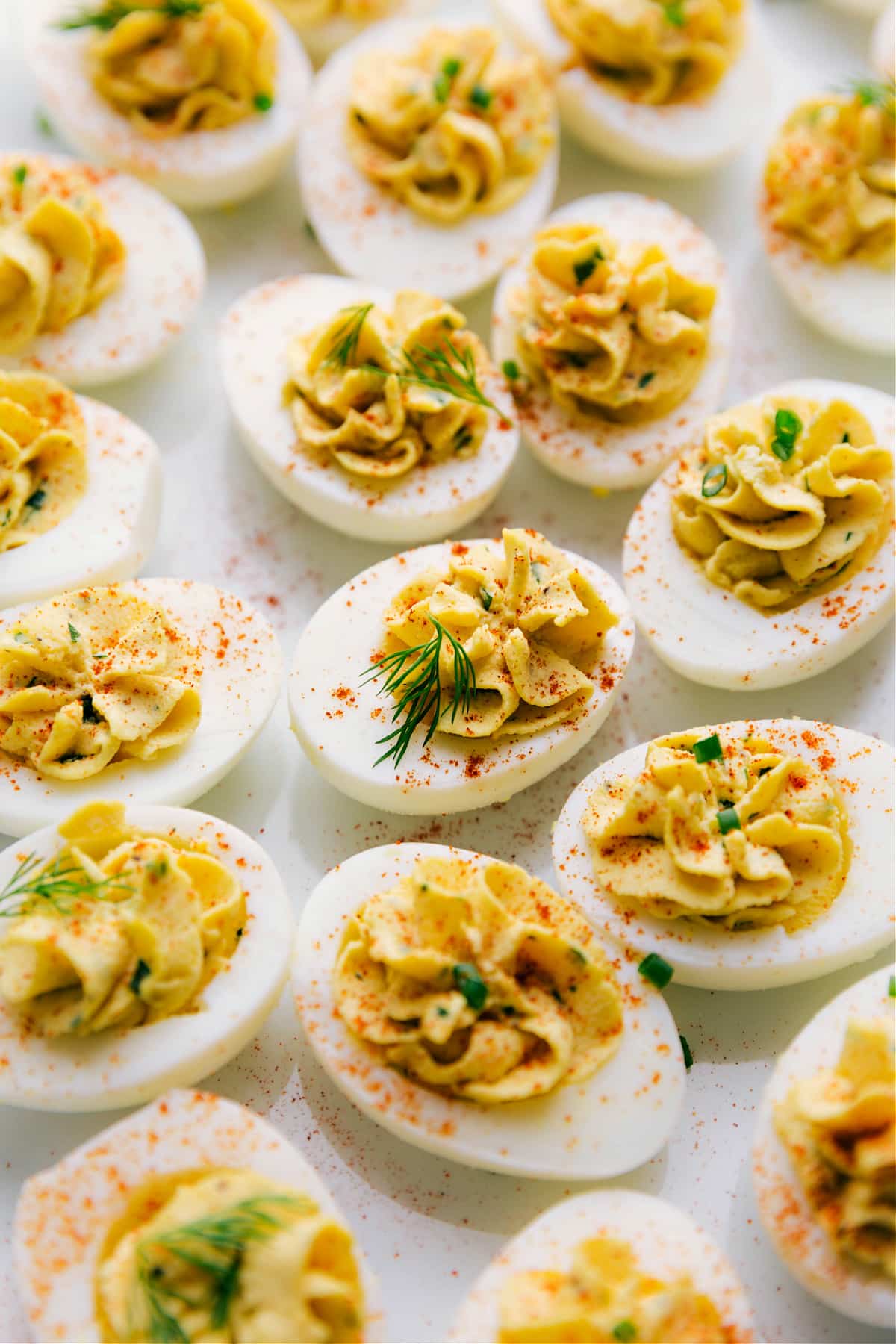 The Perfect Spring Side: Deviled Eggs Recipe The side ready to be enjoyed with fresh herbs on top.