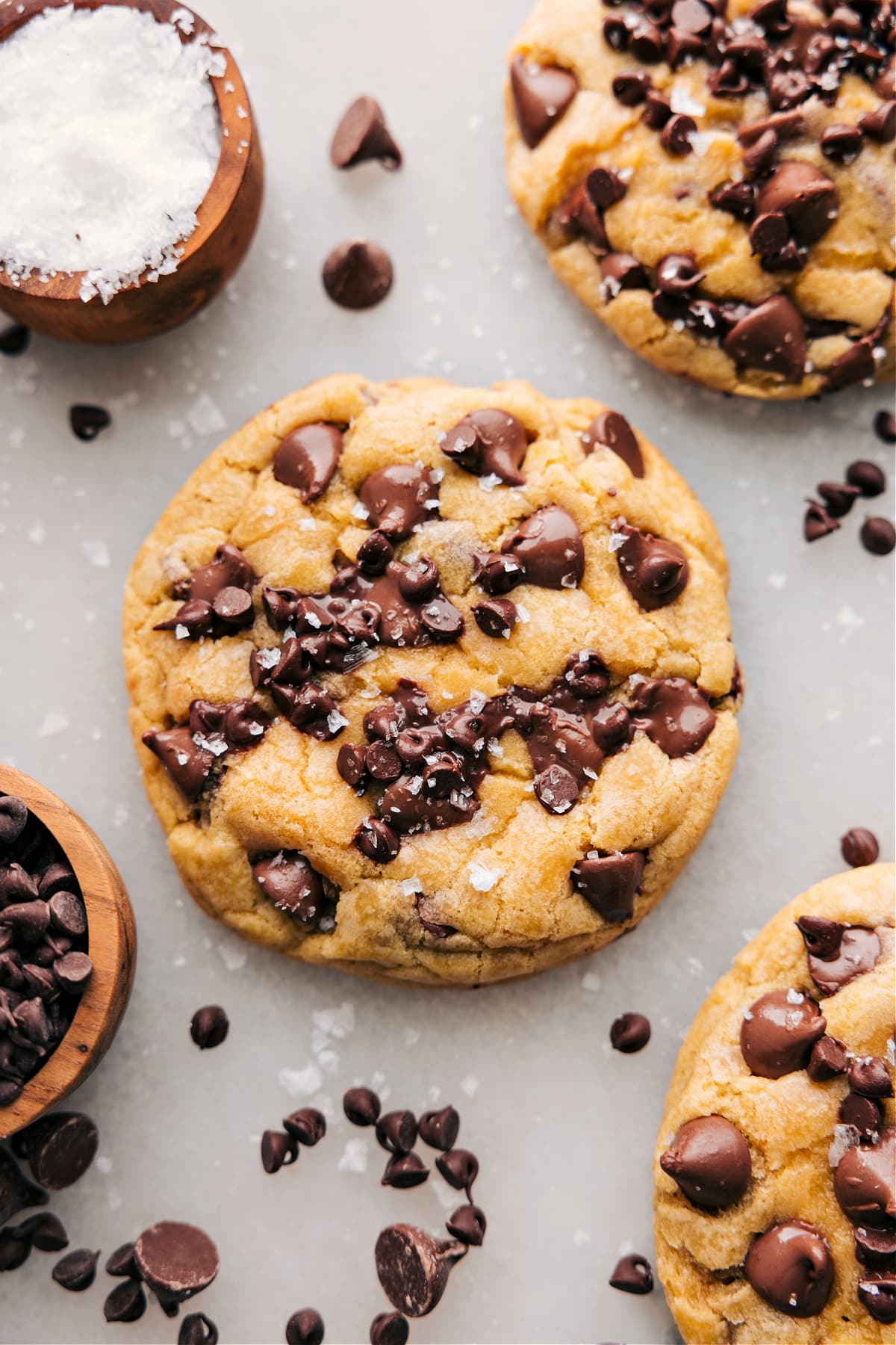 Sweet And Salty Bakery Style Chocolate Chip Cookies Freshly baked bakery-style chocolate chip cookies topped with flaky sea salt.