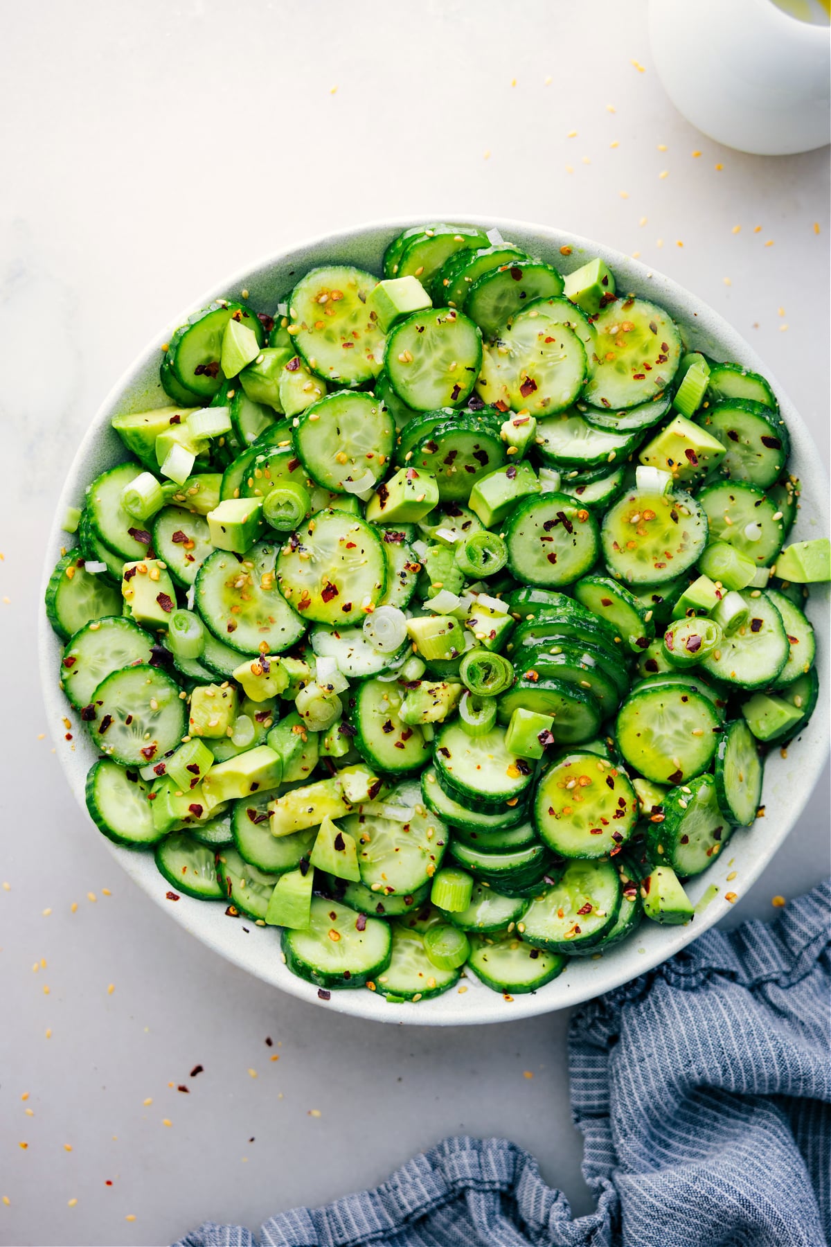 Quick And Easy Asian Cucumber Salad Recipe Asian Cucumber Salad in a bowl ready to be enjoyed.