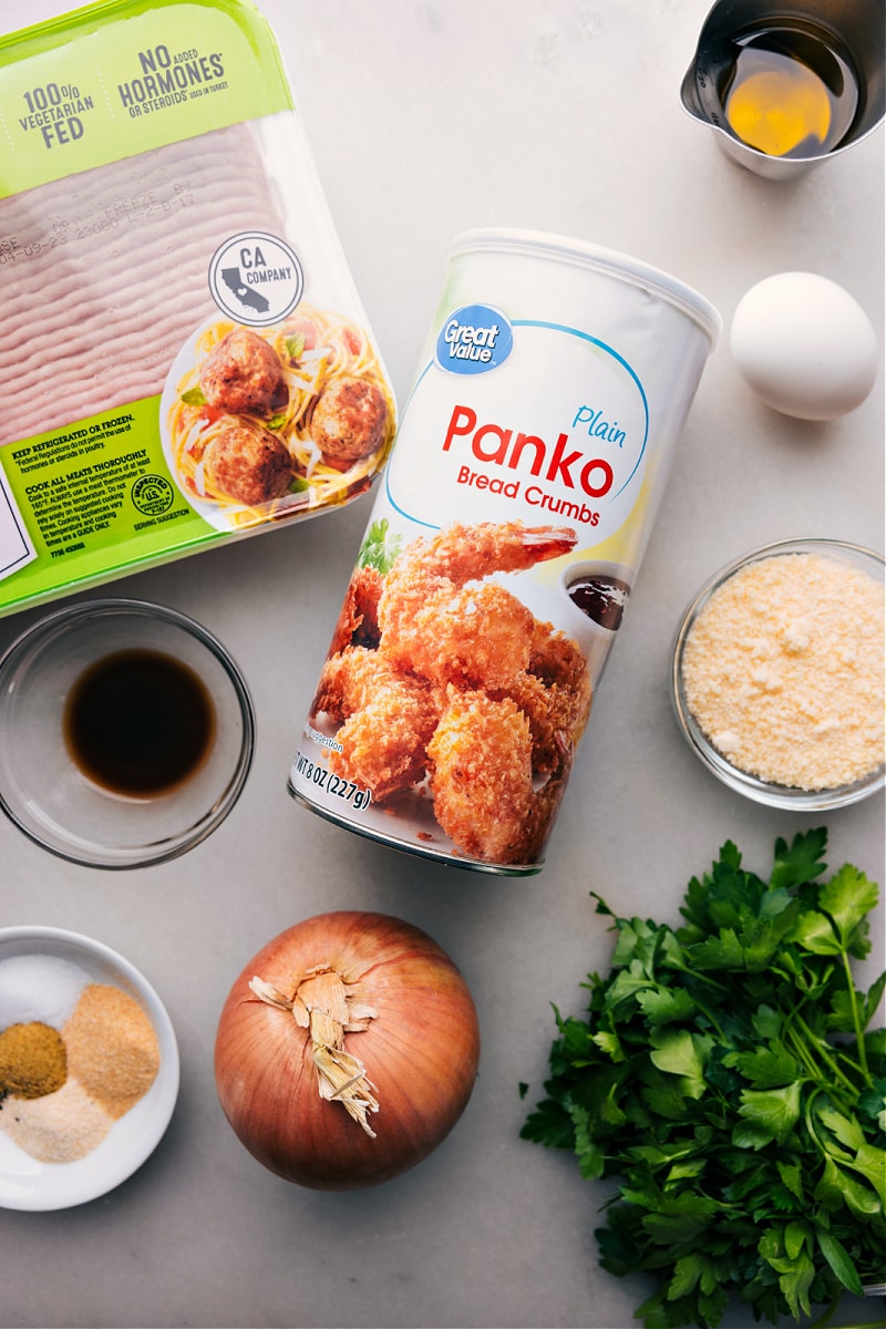 Ingredients for Turkey Meatballs: Panko, Onions, Seasonings, Meat, and More All ingredients for the recipe laid out, including panko, onions, seasonings, meat, and more.