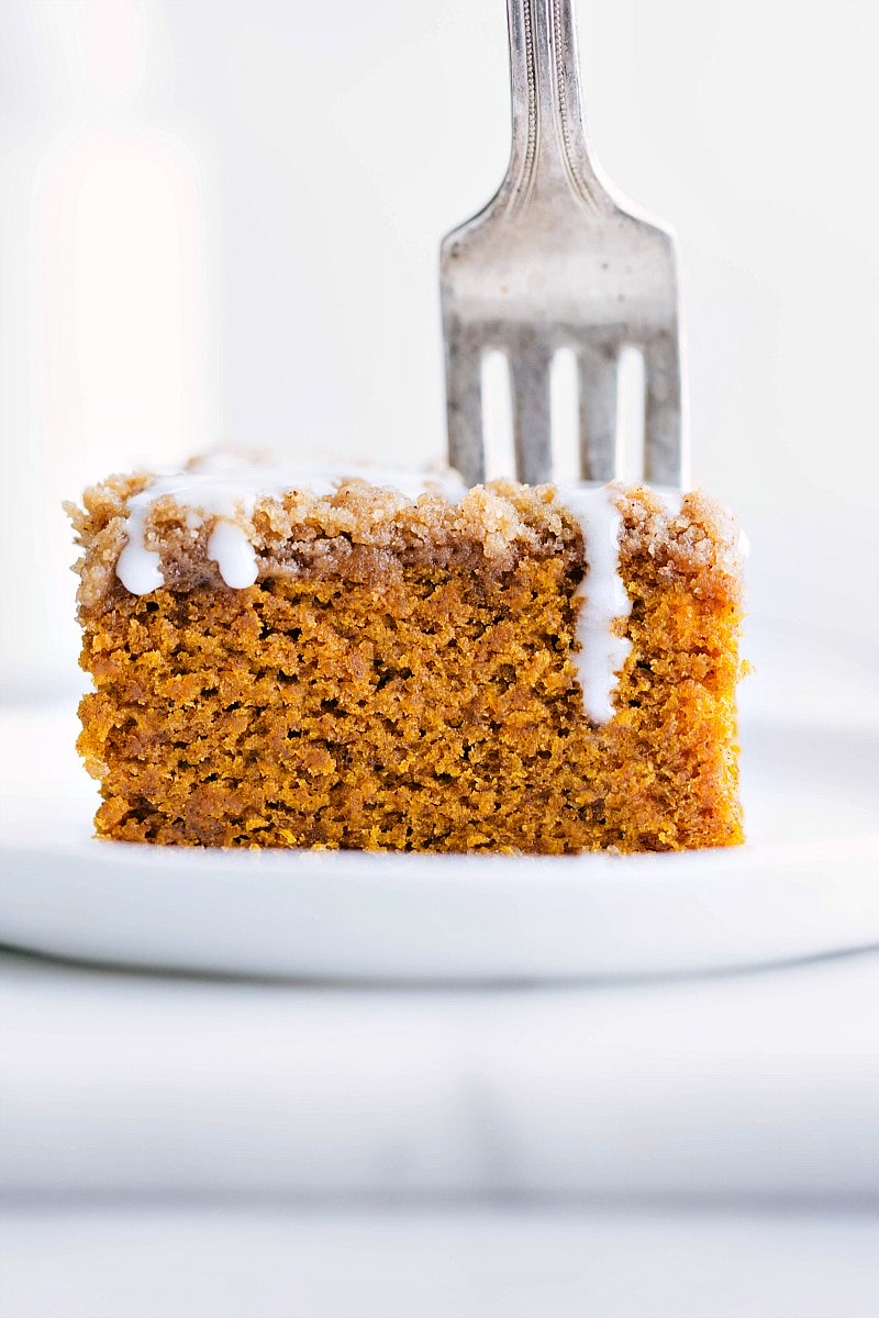 Slice of Pumpkin Coffee Cake with Icing, Ready to Be Enjoyed Delicious slice of pumpkin coffee cake with icing on top ready to be enjoyed.