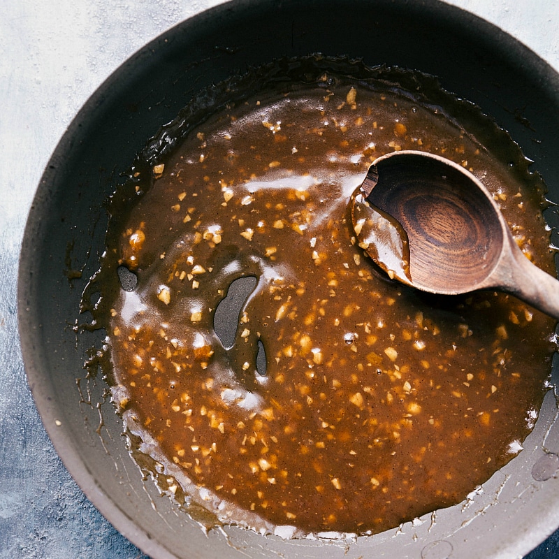 Making Sweet and Fruity Apricot Glaze Sauce in a Pan Preparing the apricot glaze sauce in a pan, a sweet and fruity sauce.