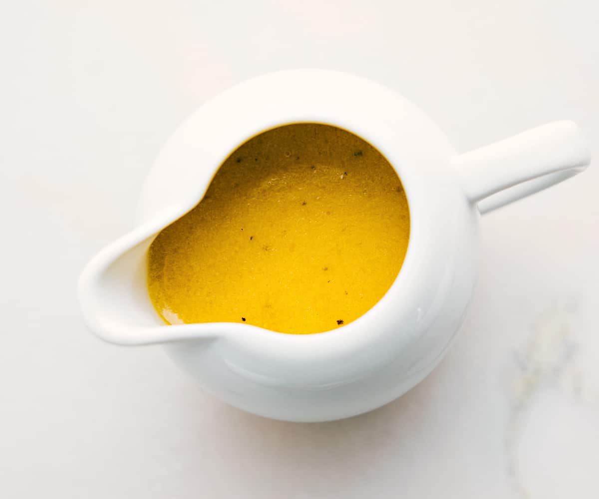 Dressing Ready For Chicken Avocado Salad Recipe The dressing for this avocado chicken salad in a little container to drizzle on the salad.