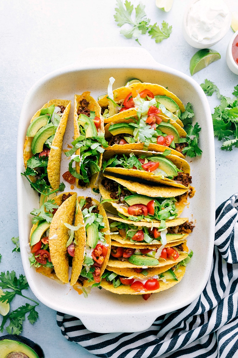 Perfect Meal: Freshly Baked Beef Tacos with a Variety of Toppings The delicious and finished beef taco recipe fresh out of the oven, topped with a variety of ingredients, creating the perfect meal.