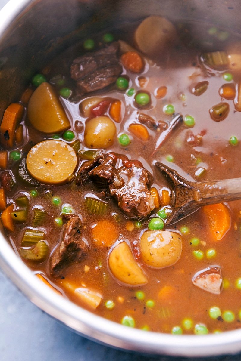 Serving Beef Stew: A Pot Full of Delicious Ingredients Delicious and hearty beef stew instant pot recipe being stirred before serving.