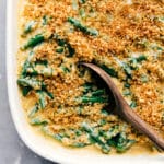 Ready-to-eat green bean casserole in a pan, showcasing its crisp top.
