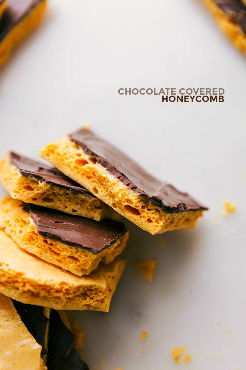Homemade Honeycomb Candy looks so fancy, yet couldn't be easier to make in your own home! This sweet, crunchy candy requires only four main ingredients -- sugar, corn syrup, vanilla, and baking soda. It's got classic honeycomb bubbles, a spongelike crisp texture, and a golden yellow exterior. For an elevated experience, the honeycomb candy can also be dipped, drizzled, or covered in melted chocolate. Recipe via chelseasmessyapron #recipe #homemade #diy #howtomake #easy #recipehomemade #chocolate #honeycomb #candy Honeycomb Candy