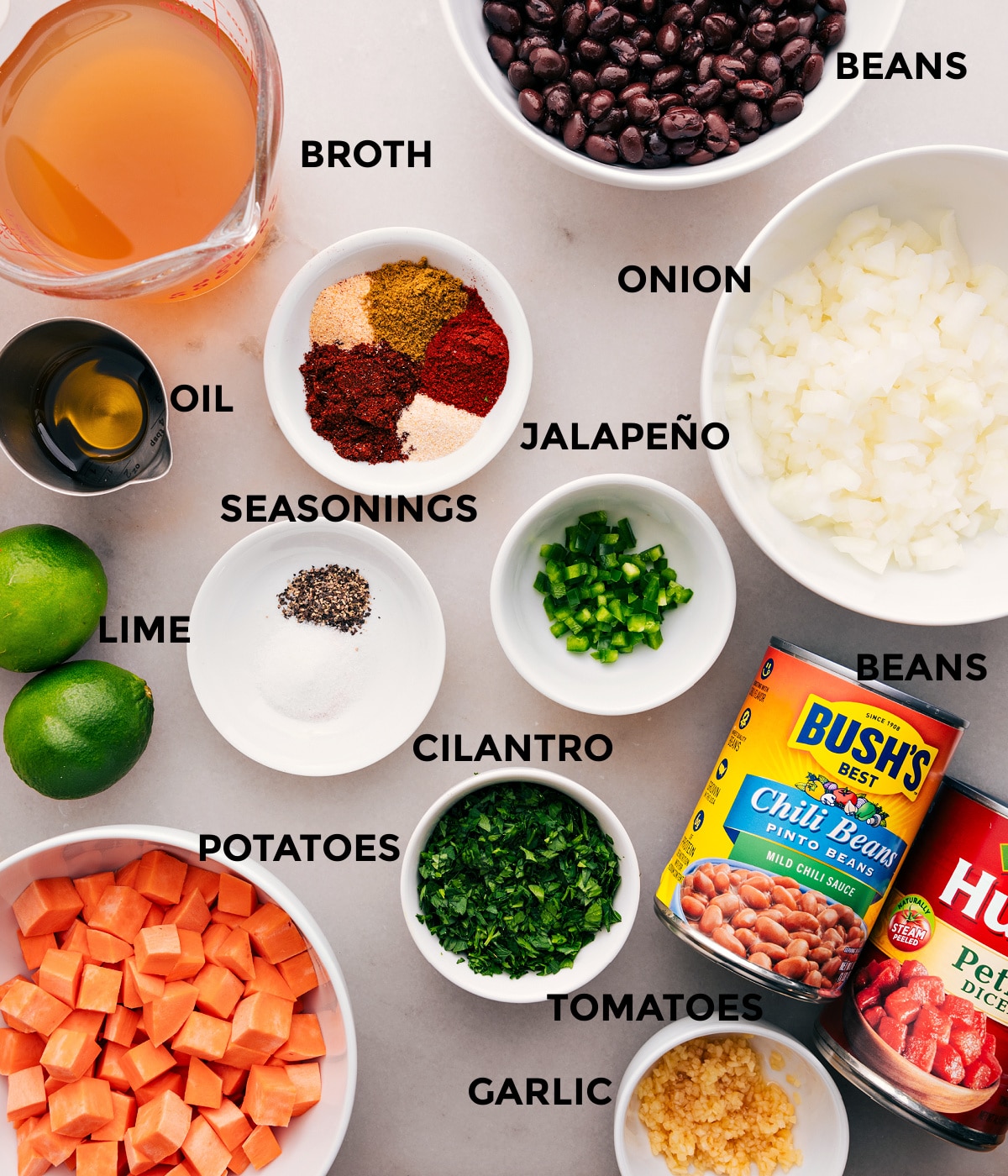 Ingredients In Sweet Potato Chili Recipe All the ingredients for this recipeโveggies, seasonings, beans, limes, broth, and tomatoesโare prepped and ready for easy assembly.
