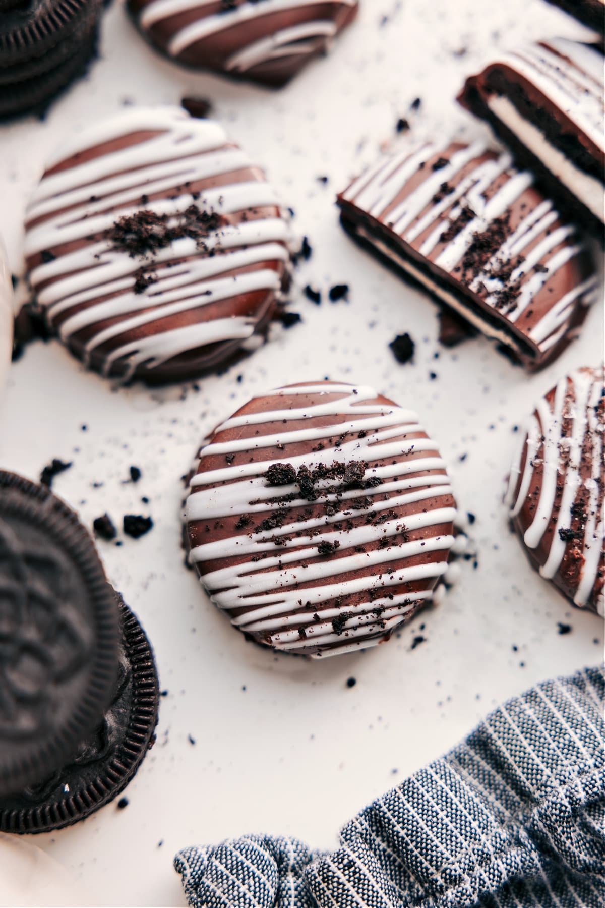Chocolate covered Oreos topped with extra Oreo crumbs.
